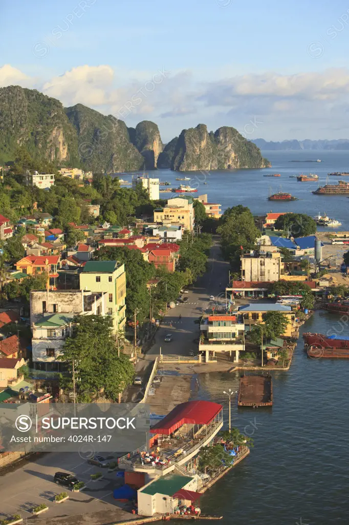 Coastal city with cliffs viewed from Bai Chay Bridge, Halong Bay, Vietnam