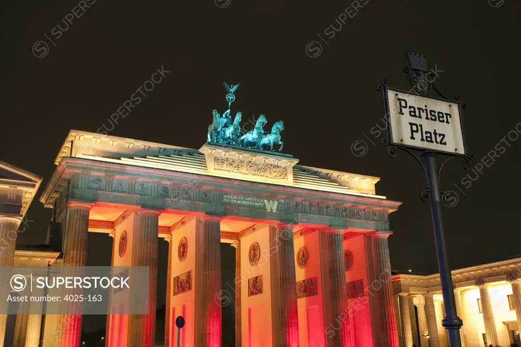 City gate lit up at night, Brandenburg Gate, Berlin, Germany