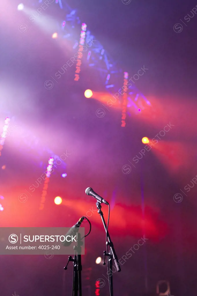 Canada, Quebec, Montreal, Montreal Jazz Festival, Close up of microphones in stage lights