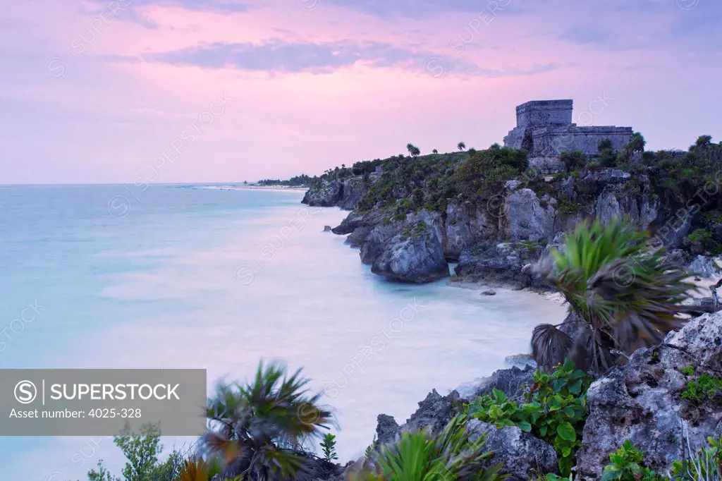 Mexico , Quintana Roo, Tulum. El Castillo facing Caribbean Sea at dawn