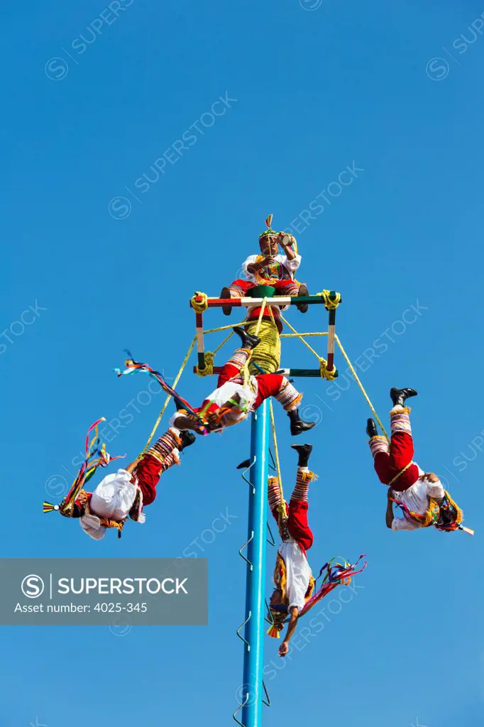 Mexico, Playa del Carmen, Voladores de Papantla (Flying men) - SuperStock