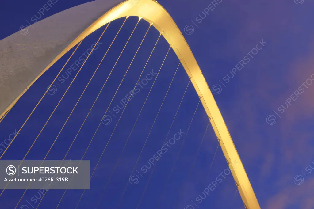 Low angle view of a suspension bridge, Gateshead Millennium Bridge, Tyne River, Newcastle-upon-Tyne, Northumberland, England