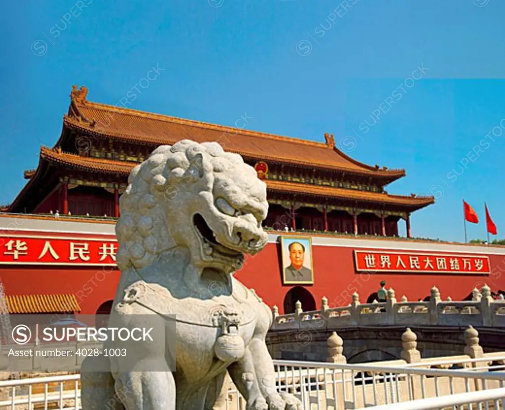China, Beijing, The Forbidden City, Gate of Heavenly Peace, formidable stone lion guarding the entrance at the North Gate.