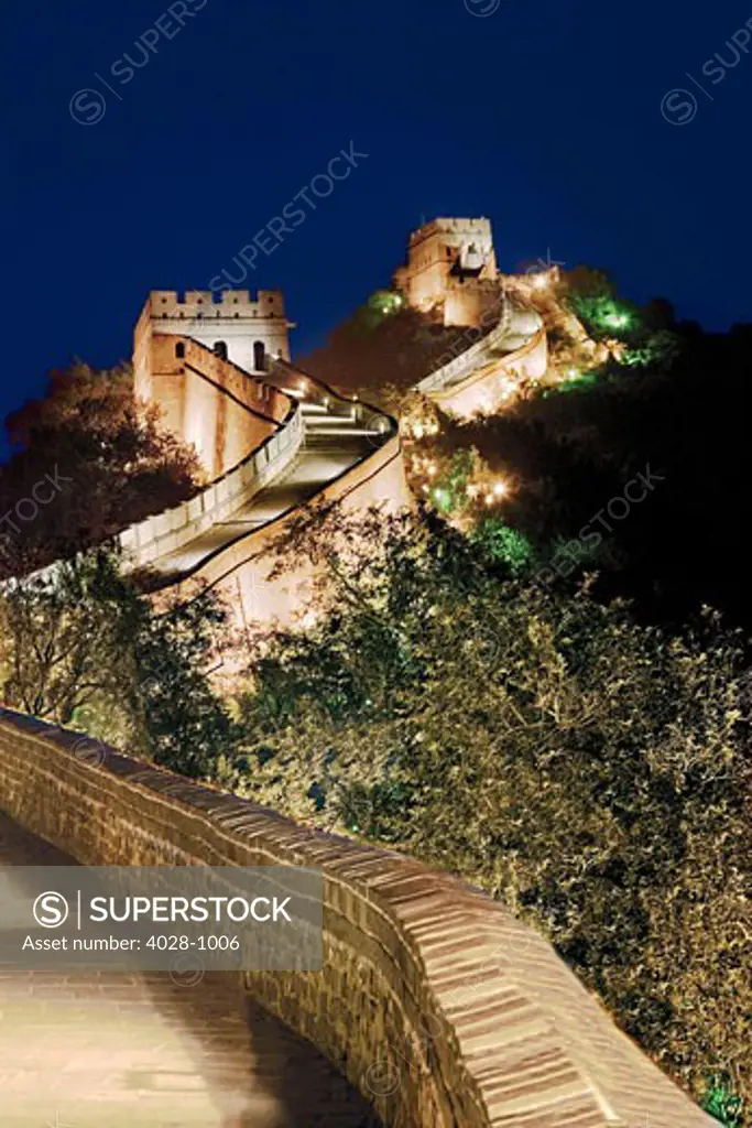 China, Badaling, Great Wall, view of Watchtowers illuminated at night.