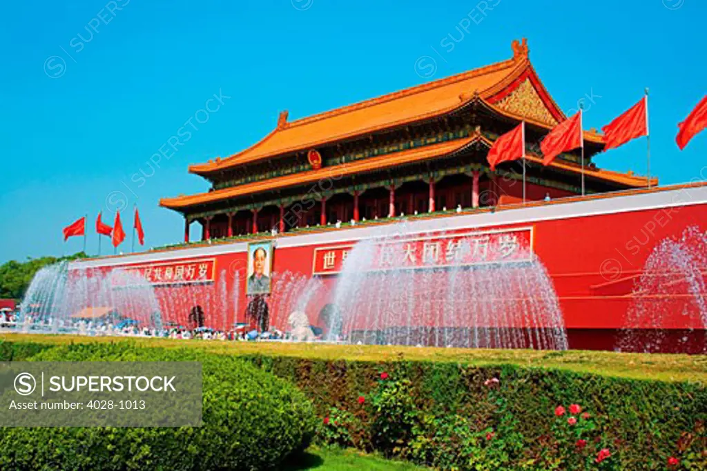 China, Beijing, The Forbidden City, Gate of Heavenly Peace gardens and fountains in front.