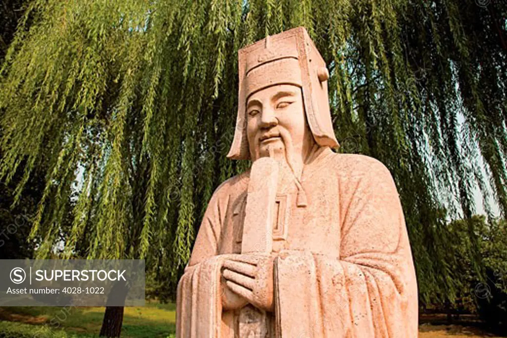 China, Beijing, Ming Dynasty Tombs, Spirit Way, A stone statue of an ancient philosopher or Wiseman along the avenue.