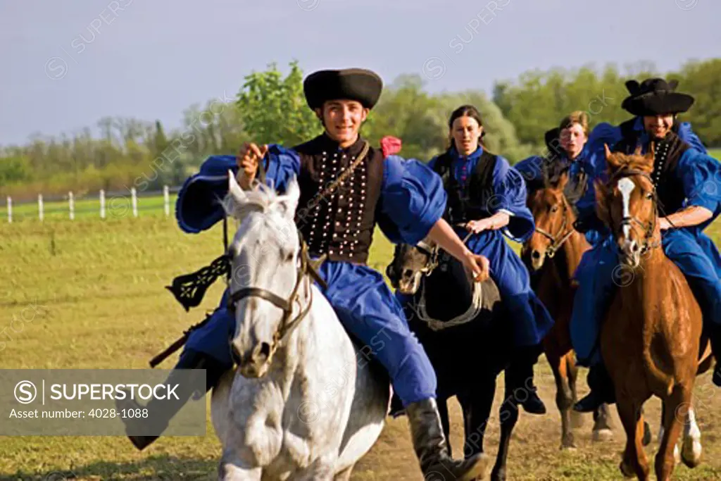 Hungary, Kalocsa, Csikos Hungarian horse riders.