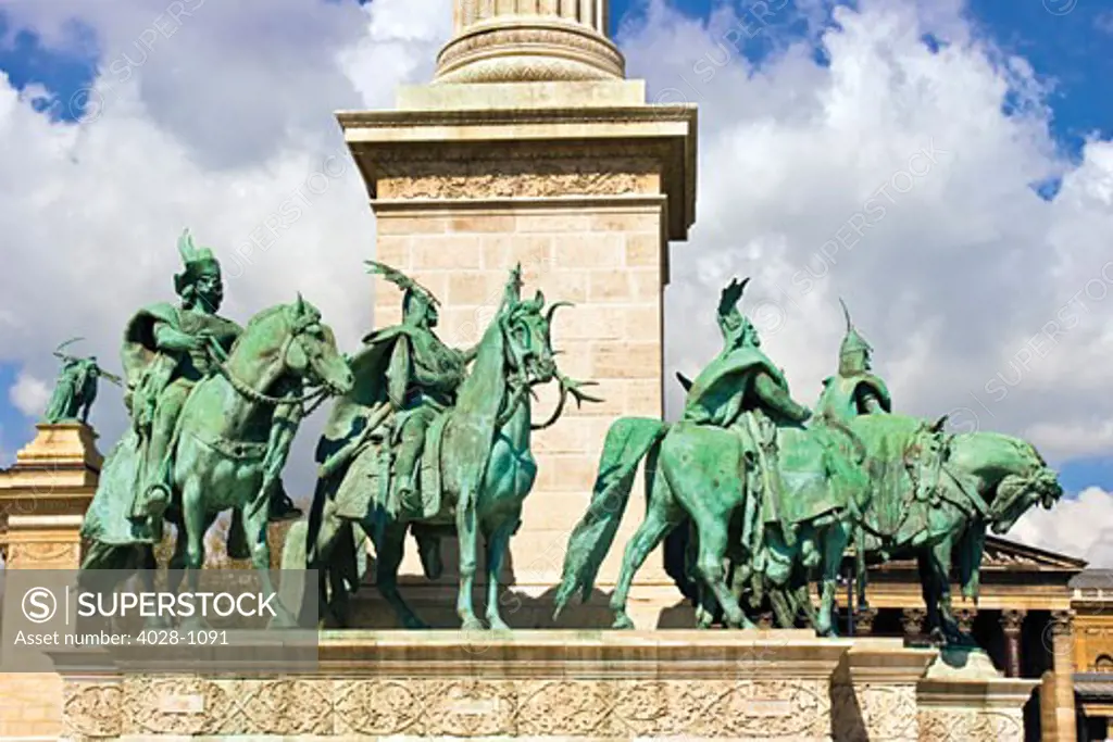Budapest, Hungary, At the center of Heroes' Square stands the Millennium Memorial with statues of the leaders of the seven tribes that founded Hungary in the 9th century