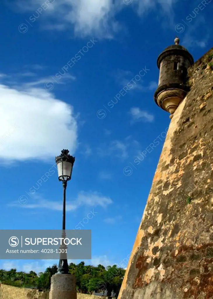 Puerto Rico, San Juan, Fort San Felipe del Morro, view of guard tower and ornate street lamp.