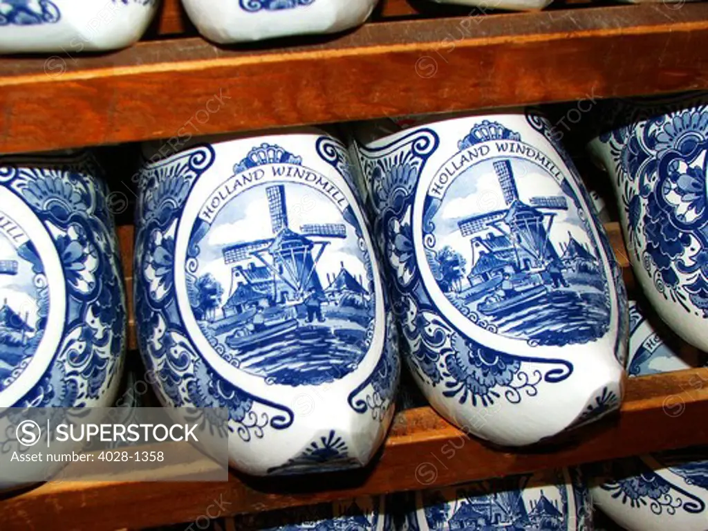 Delftware, or Delft pottery, wooden clogs as souvenirs, Delft, Province of South Holland, the Netherlands