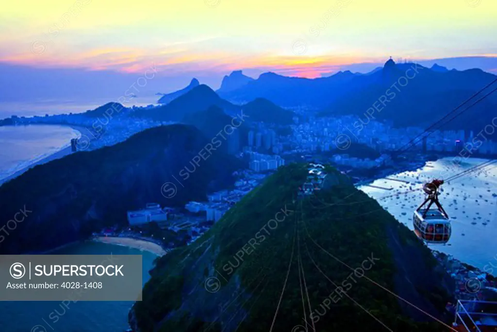 Brazil, Rio De Janeiro, cable car goes to Sugar Loaf Mountain.