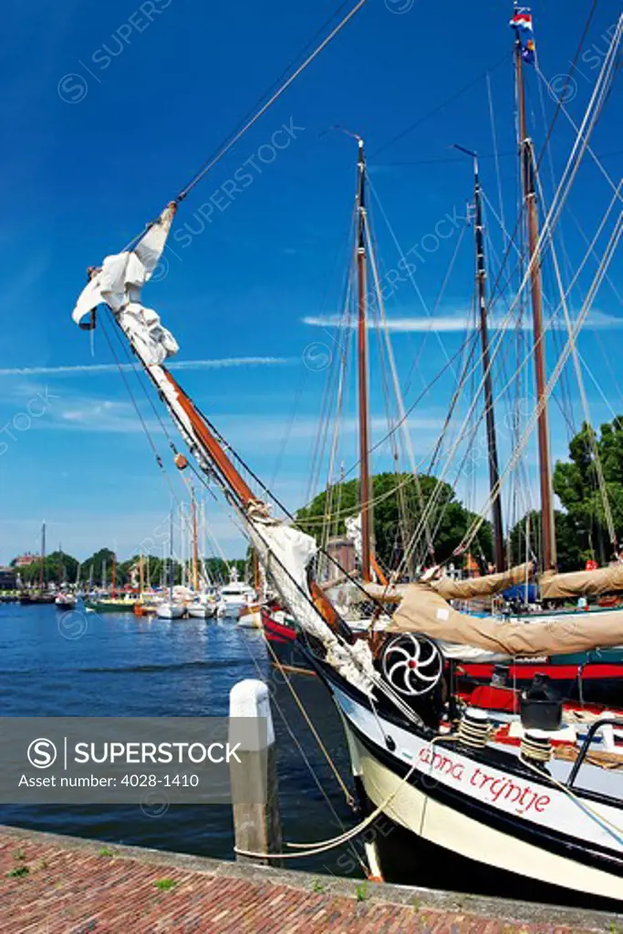 Netherlands, Enkhuizen, Classic Dutch vessels in the canal.