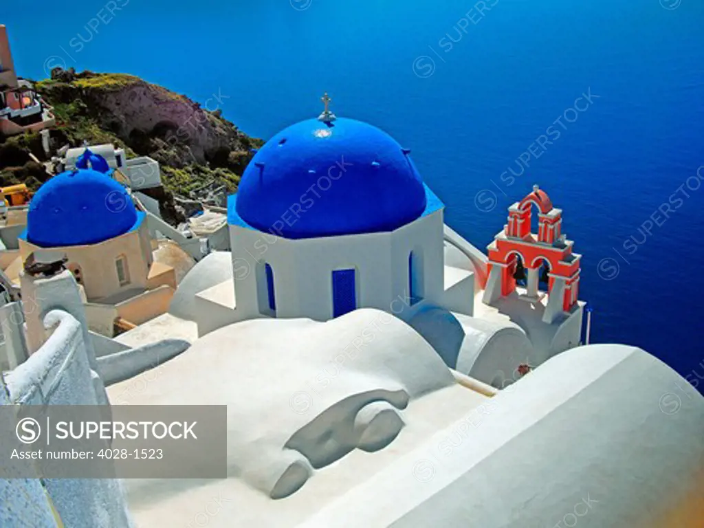 Greece, Aegean islands, Cyclades, Santorini, Oia, blue domes and church bells.