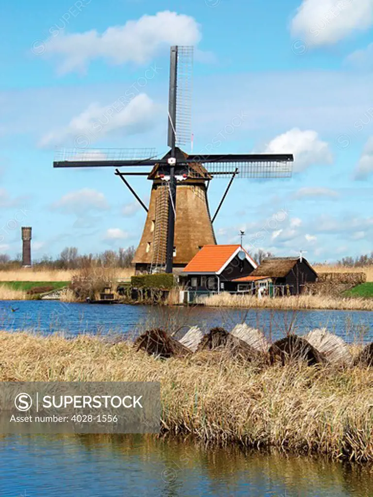 Netherlands, Kinderdijk, An ancient windmill still working.