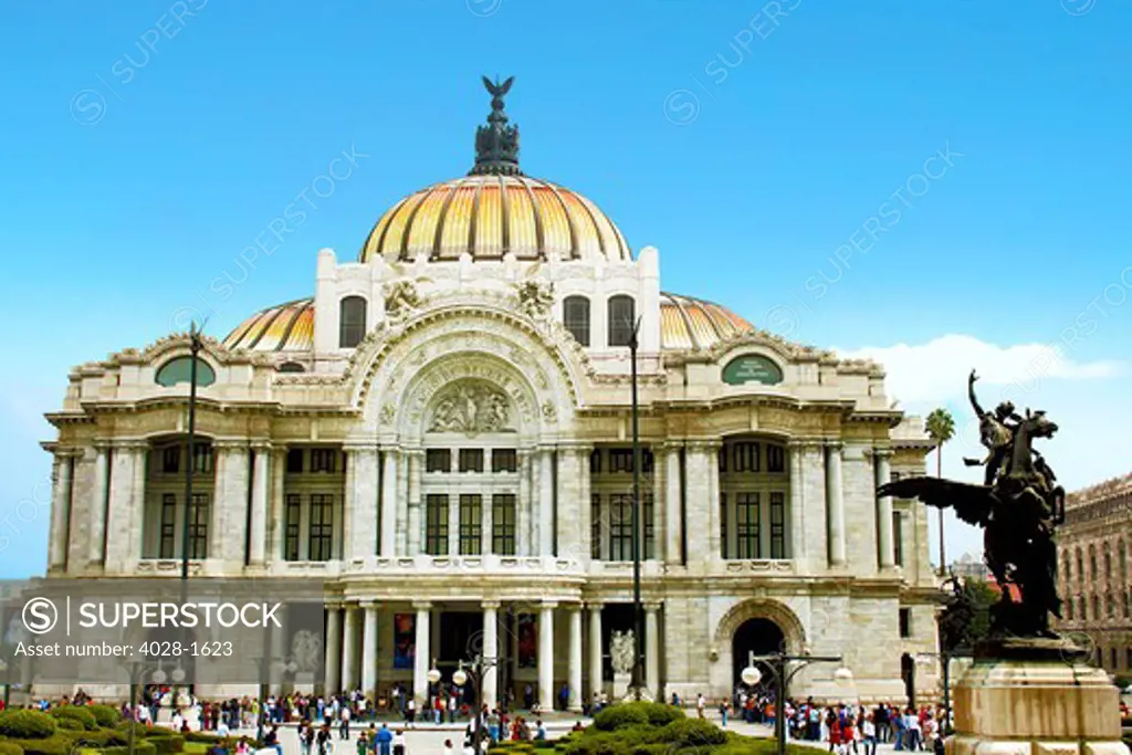 Palacio de Bellas Artes in Mexico City. The building is famous for both its extravagant Beaux Arts exterior in imported Italian white marble and its murals by Diego Rivera. It used to be a train station.