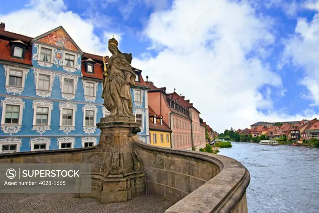 Bamberg, Germany, Bavaria, Queen Kunigunda statue  stands over the Regnitz river next the town hall (Rathaus) in the center of old town.