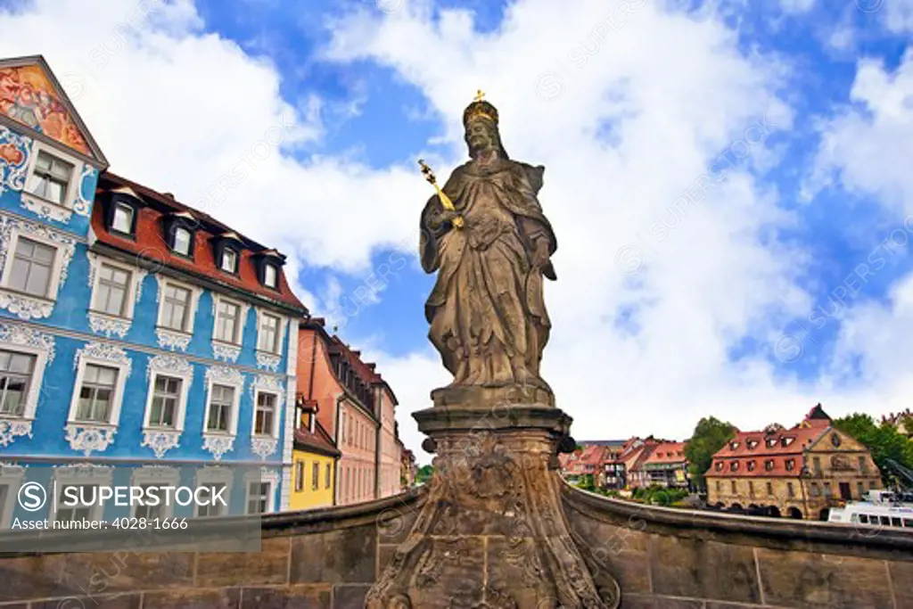 Bamberg, Germany, Bavaria, Queen Kunigunda statue  stands over the Regnitz river next the town hall (Rathaus) in the center of old town.
