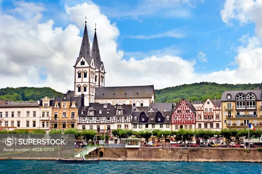 Boppard, Germany, Rhineland-Palatinate, cross timbered houses and the Church of St. Severus along the Rhine river
