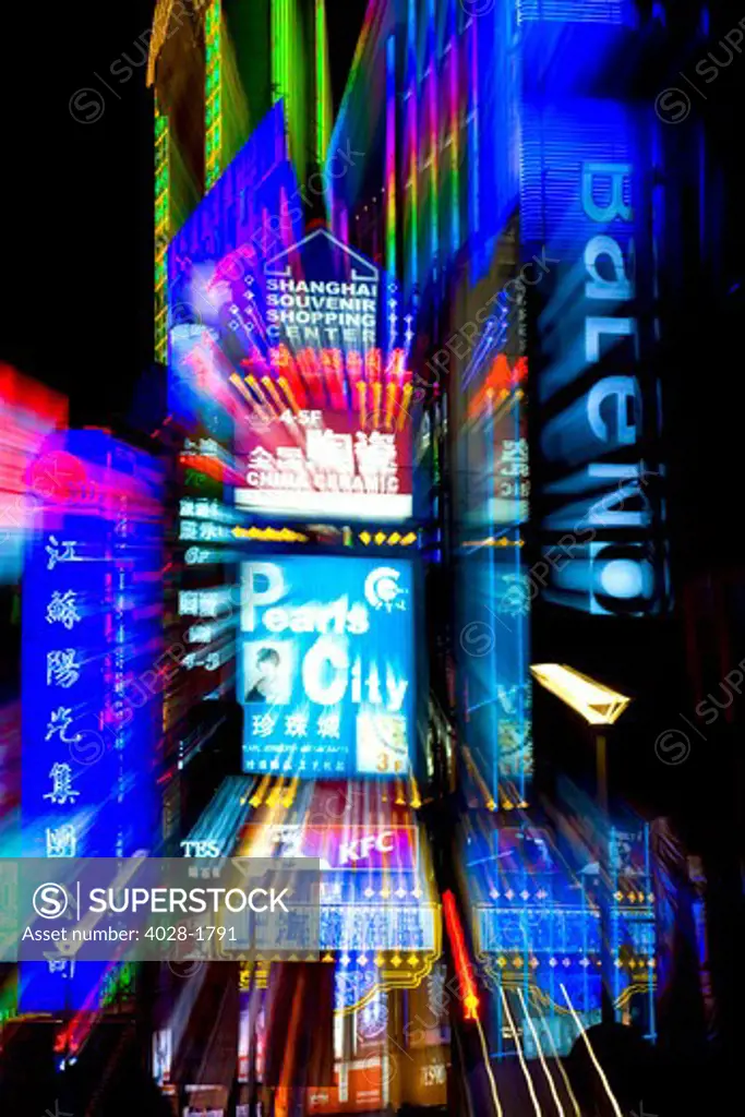 China, Shanghai, Nanjing Road, The neon signs along the shopping and business center at night.
