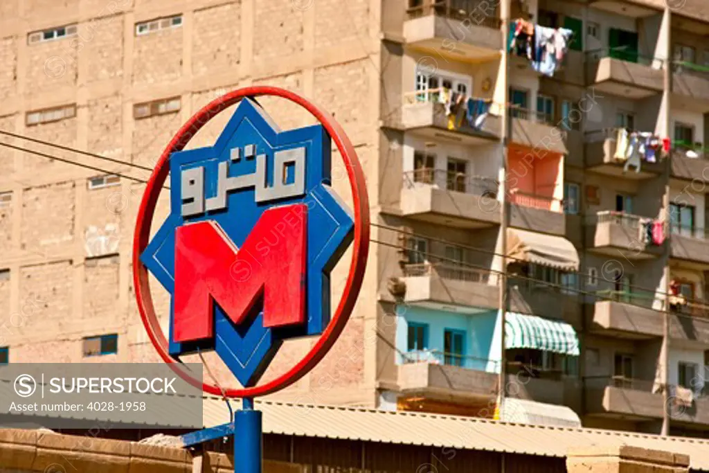 Cairo, Egypt, Metro Station Sign near an apartment building