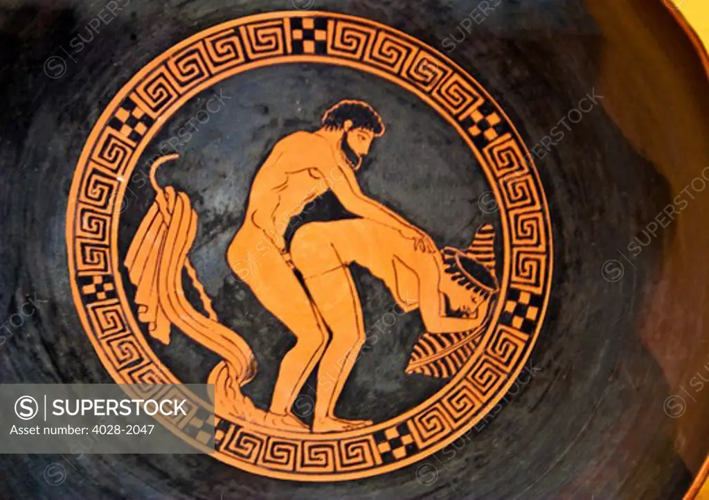 Red figure cylix with an erotic scene in the Secret Cabinet of the National Archaeological Museum (museo archeologico nazionale) in Naples, Italy.
