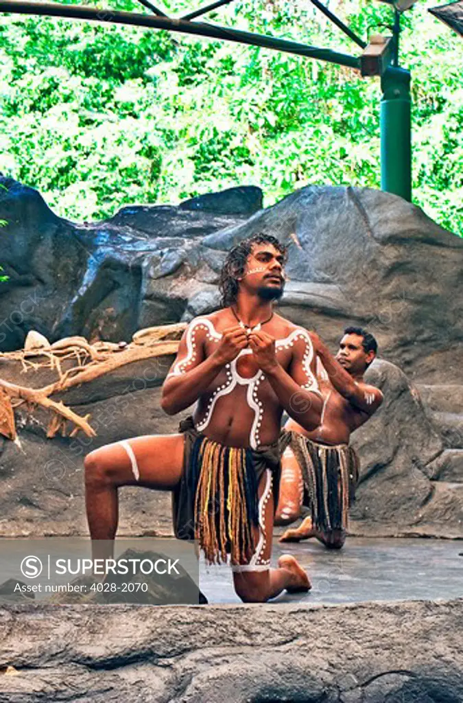 Cairns, Australia,  Aborigine men performing on stage at Tjapukai Aboriginal Cultural Park