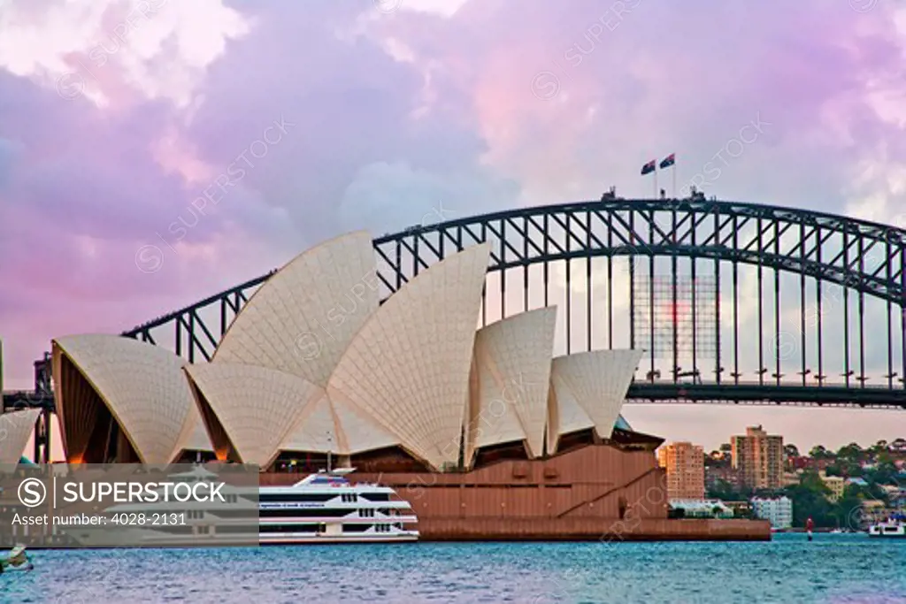 Australia, Sydney, New South Wales, Sydney harbor Bridge and Sydney Opera House at Sunset
