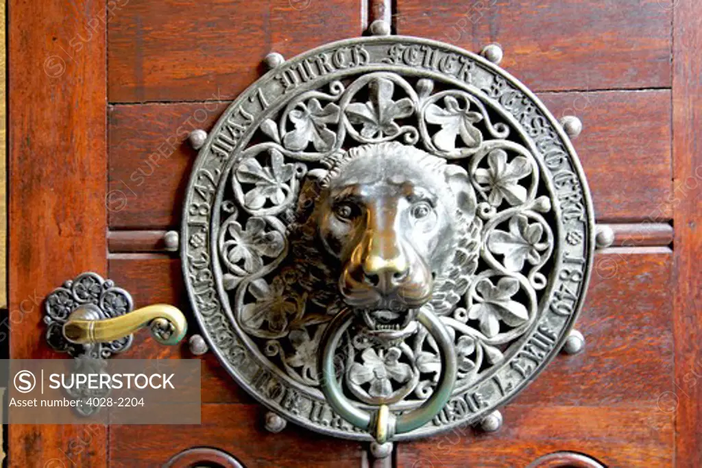 Lion's head door knocker on the Saint Peter Church (Sankt Petrikirche) entryway, Hamburg, Germany. The oldest (1342) public piece of art in Hamburg