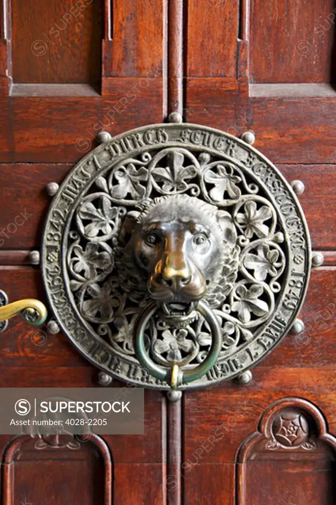 Lion's head door knocker on the Saint Peter Church (Sankt Petrikirche) entryway, Hamburg, Germany. The oldest (1342) public piece of art in Hamburg