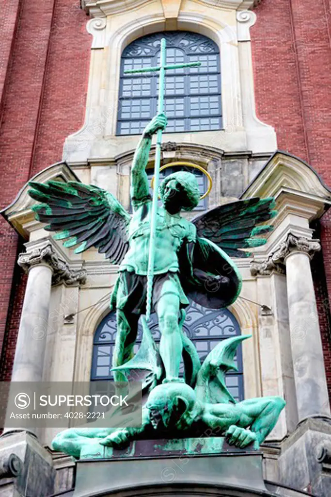 Sculpture of the archangel Michael defeating Satan, St Michaelis Church, Hamburg, Germany