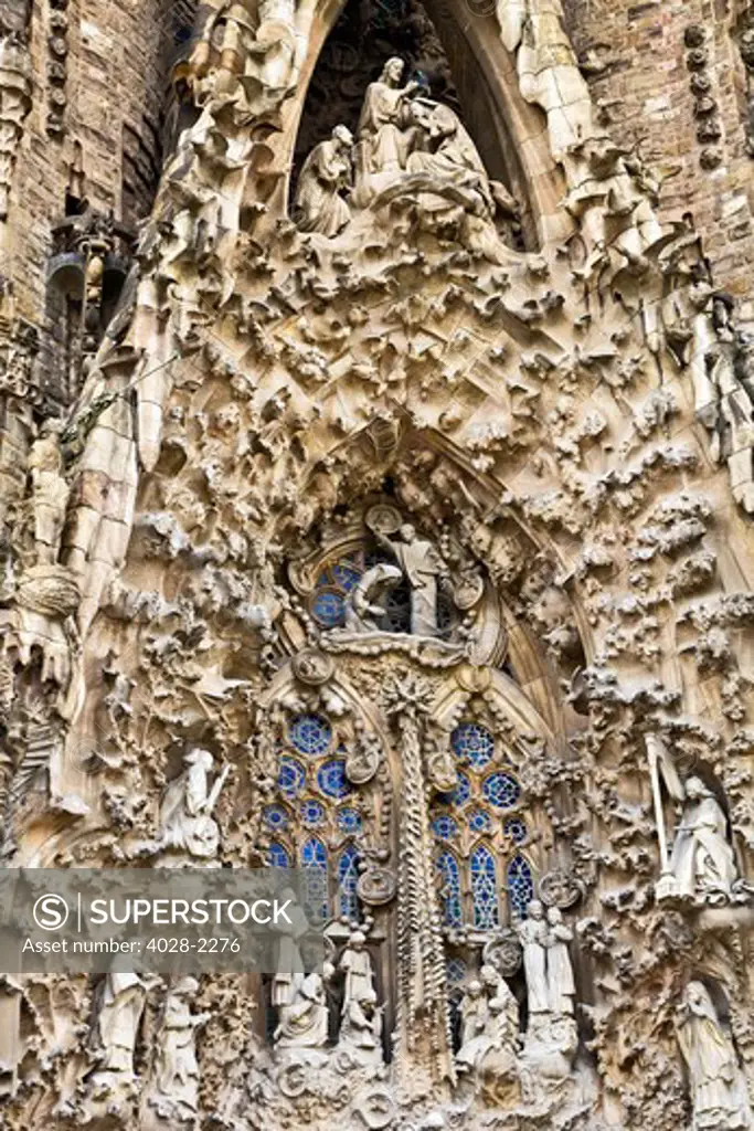 Spain, Catalonia, Barcelona, Sagrada Familia, statues and stonework of  the Nativity facade (Gaudi architect).