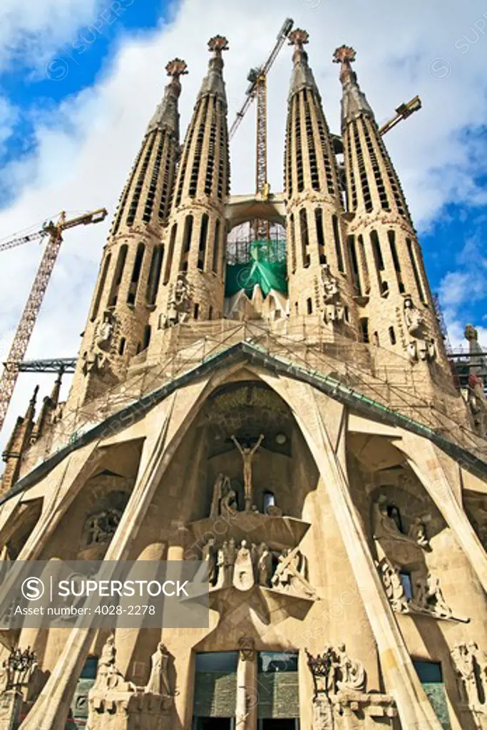 Barcelona, Catalonia, Spain, ornate Passion Facade of  the Temple of Sagrada Familia, by architect Josep Maria Subirachs