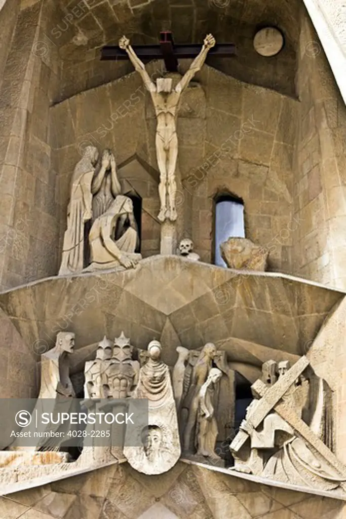 Barcelona, Catalonia, Spain, statues and stonework of  the Passion Facade of  the Temple of Sagrada Familia, by architect Josep Maria Subirachs. The calvery and Crucifixion of Jesus Christ