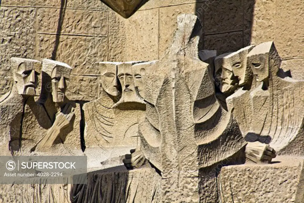Barcelona, Catalonia, Spain, statues and stonework of  the Passion Facade of  the Temple of Sagrada Familia, by architect Josep Maria Subirachs. The last supper of Jesus Christ.