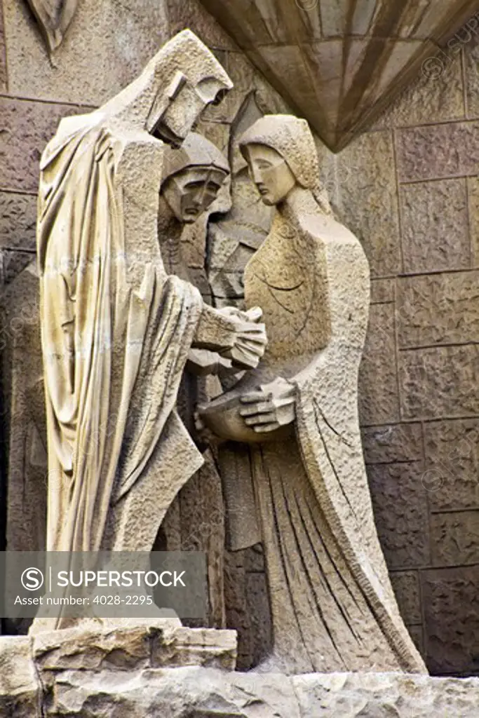 Barcelona, Catalonia, Spain, statues and stonework of  the Passion Facade of  the Temple of Sagrada Familia, by architect Josep Maria Subirachs. Mary and Joseph react to the judgement of Jesus.