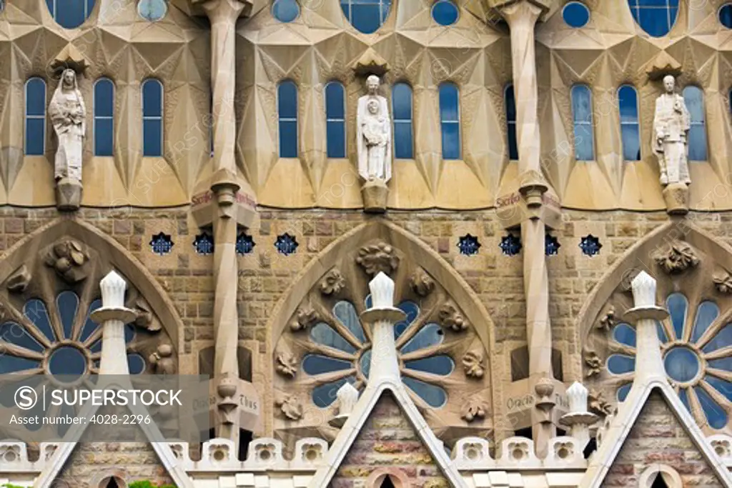 Barcelona, Catalonia, Spain, statues and stonework of  the west side of the Glory Facade entrance of  the Temple of Sagrada Familia, by architect Josep Maria Subirachs.