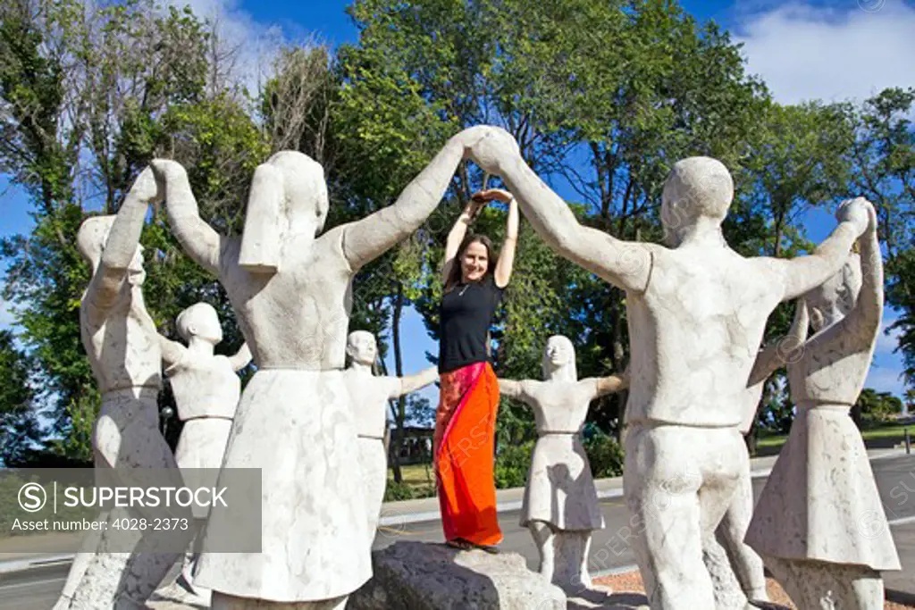 Barcelona, Catalonia, Spain, A woman dances in the center of the Sardana Dance Monument Montjuic mountain Park