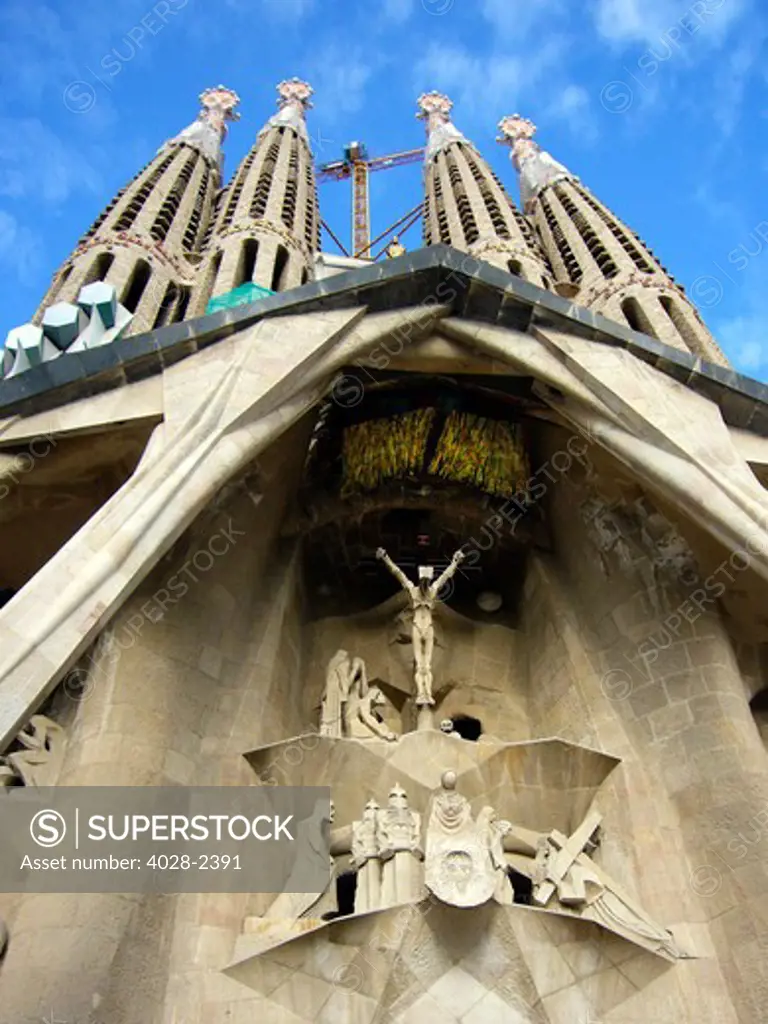 Barcelona, Catalonia, Spain, statues and stonework of  the Passion Facade of  the Temple of Sagrada Familia, by architect Josep Maria Subirachs.  The calvery and Crucifixion of Jesus Christ