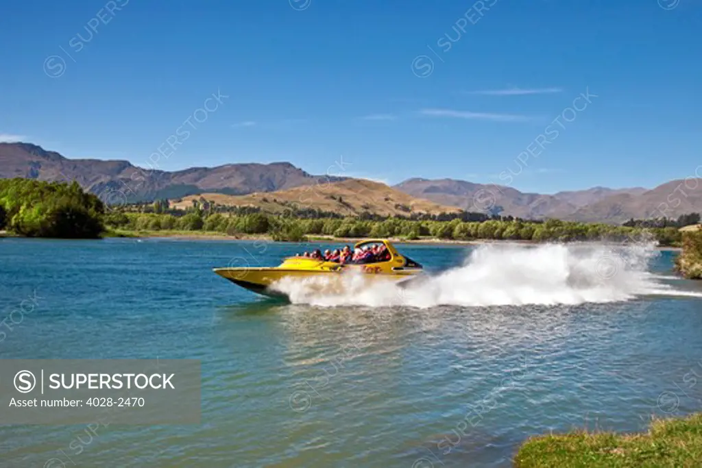 New Zealand, South Island, Clutha-Central Otago, Queenstown, thrill seekers and tourists on jet boat on Shotover River and Shotover Canyons