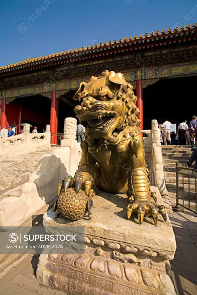 China, Beijing, Forbidden City, Gate of Celestial Purity (Qianqingmen), Gilded bronze lion guarding entrance to the Inner Court.