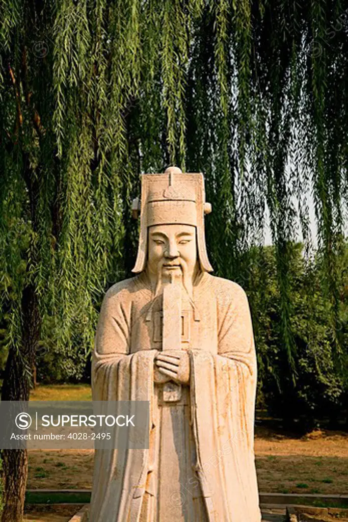 China, Beijing, Ming Dynasty Tombs, Spirit Way, A stone statue of an ancient philosopher or Wiseman along the avenue.