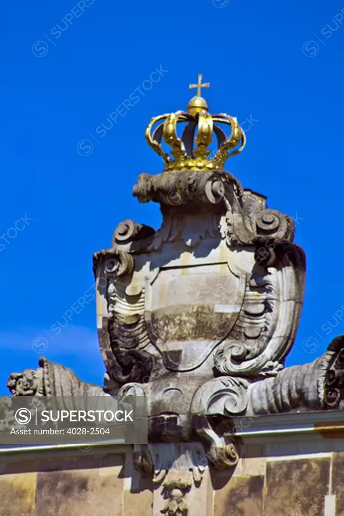 Potsdam, Brandenburg, Germany, detail of the golden royal crest atop of the baroque New Palace (Neues Palais) in the  Sans Souci Park
