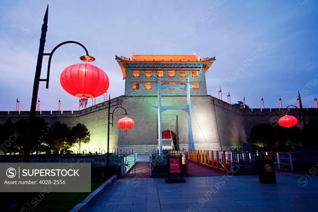 China, Xi'an, Xi'an City Wall, South Gate, A traditional red Chinese lantern is aglow.