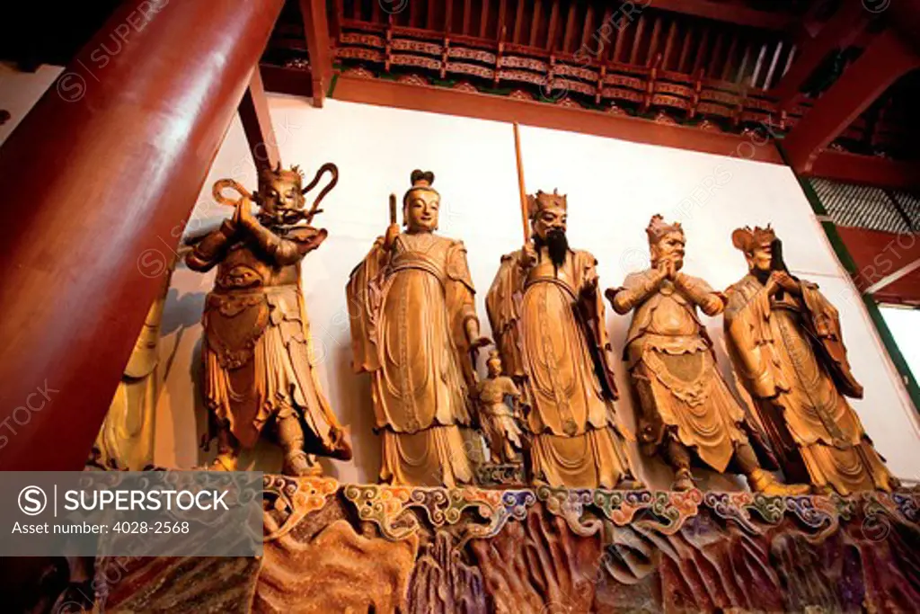 China, Hangzhou, Lingying Buddhist Temple, Large metal statues of various Chinese gods.