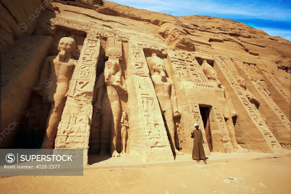 Egypt, Abu Simbel, the gate keeper stands in front of the temple of Hathor and Nefertari, also known as the Smaller Temple.
