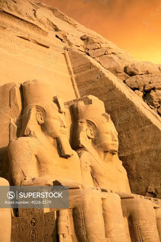 Egypt, Abu Simbel, The Greater Temple of Ramses II, Colossal statues of King Ramesses II near Lake Nasser.