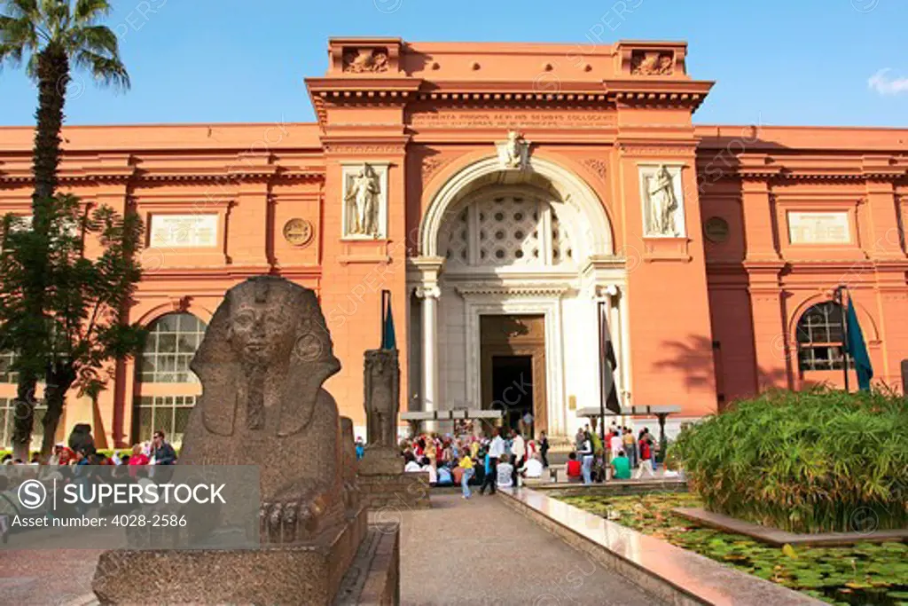 Egypt, Cairo, the Museum of Egyptian Antiquities, Small Sphinx statue in front.