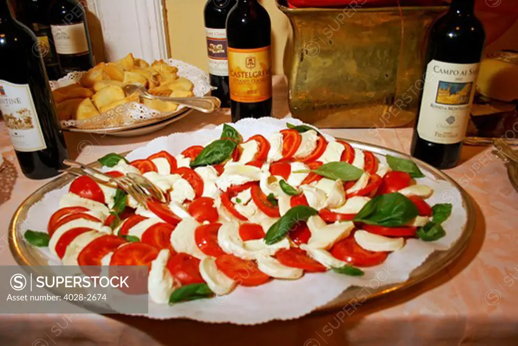 Rome, Italy Tomato and mozzarella and red wine buffet table