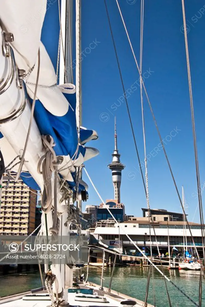 Auckland, New Zealand, the city skyline with the Sky Tower and harbor from a sailboat