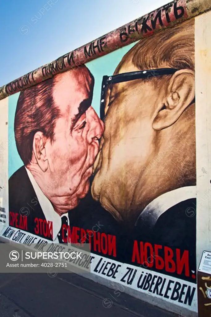 Berlin, Germany, Berlin Wall, East Side Gallery Friedrichshain, Detail of the painting by Russian artist Dimitry Vrubel of Brezhnev kissing Honecker